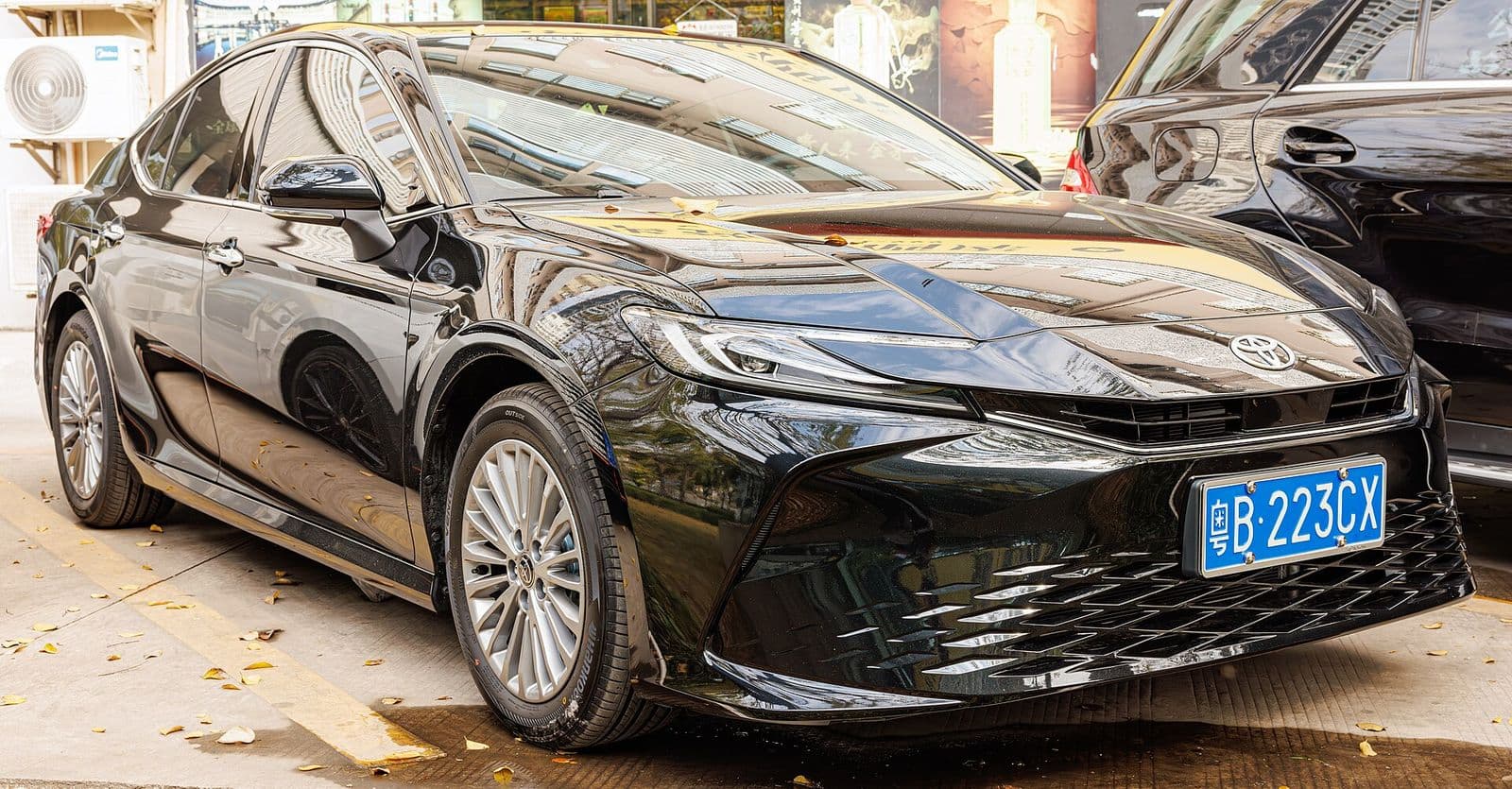 2026 Toyota Camry — China-market Toyota Camry XV80 in black, front three-quarter view — sedan for export